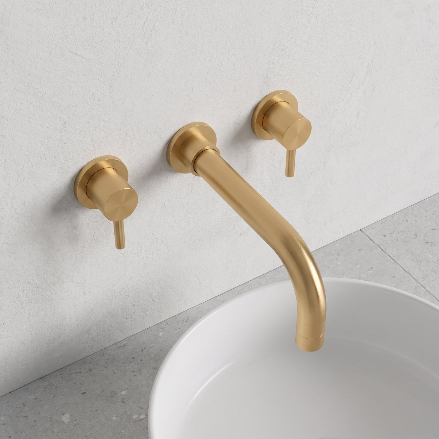 Fairford Element 5 Brushed Brass Wall Mounted Basin Mixer, 3 Hole — Soft Grey Microcement lifestyle