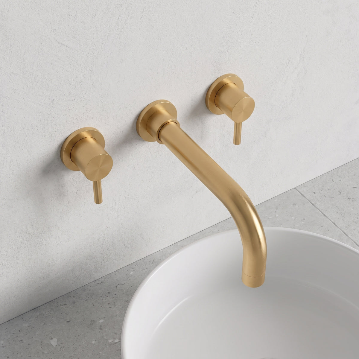 Fairford Element 5 Brushed Brass Wall Mounted Basin Mixer, 3 Hole — Soft Grey Microcement lifestyle