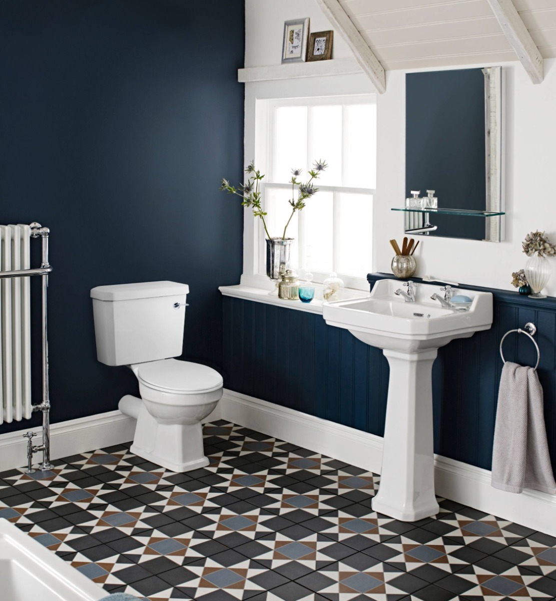blue and white vintage bathroom with shiplap panels