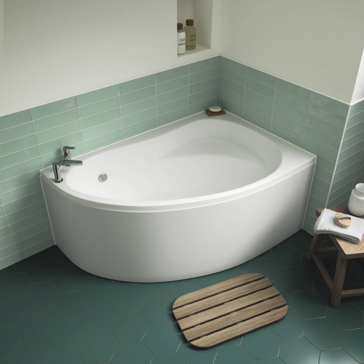 corner bath with green tiles and turquoise floor 