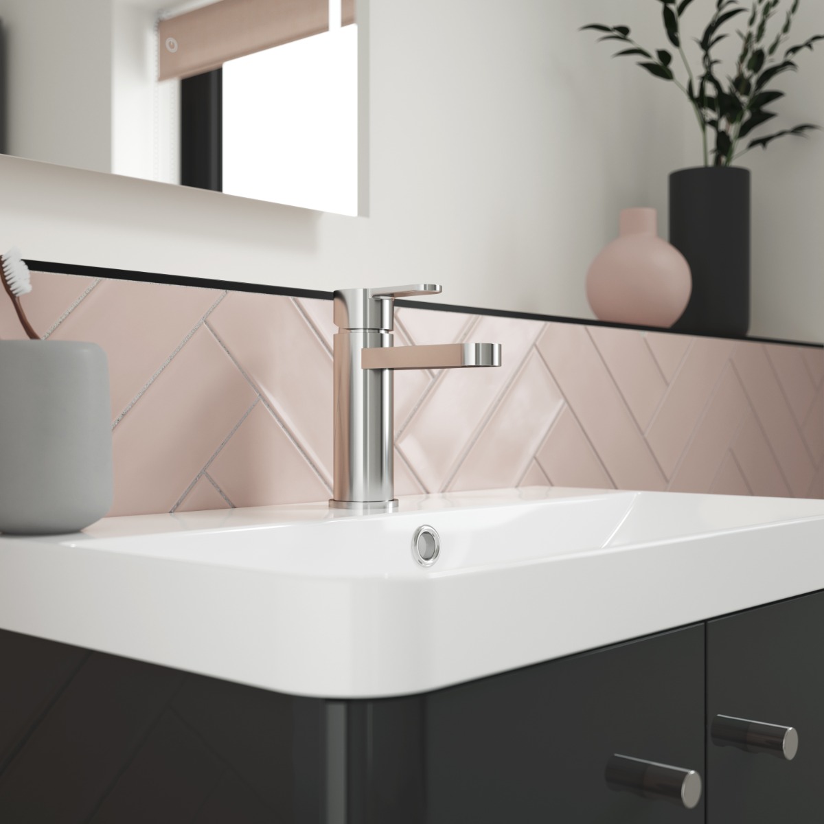 chome tap in pink bathroom