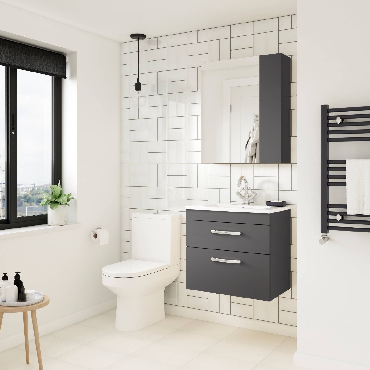 black and white bathroom with white tiles and black furniture