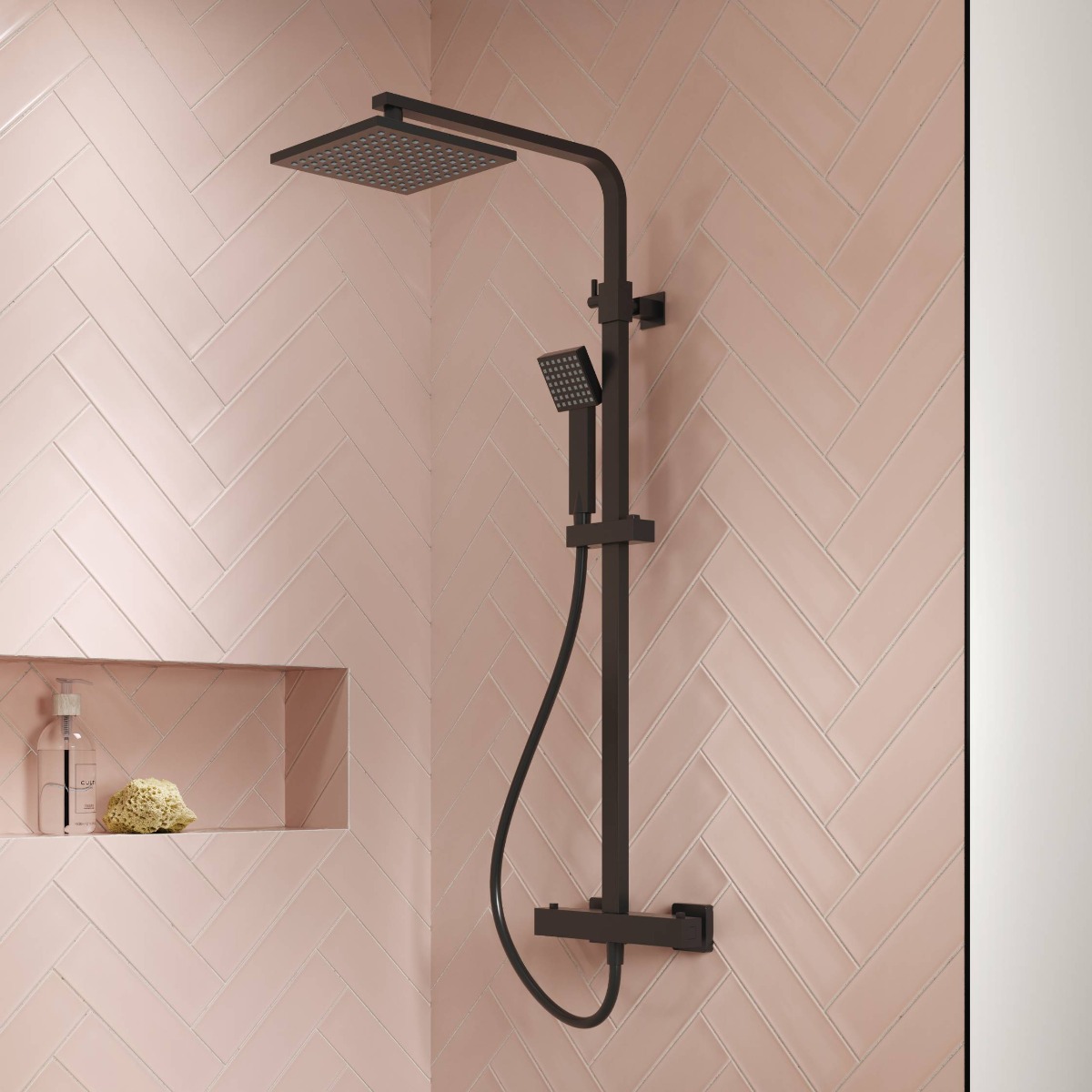 pink tiles in bathroom with matte black shower