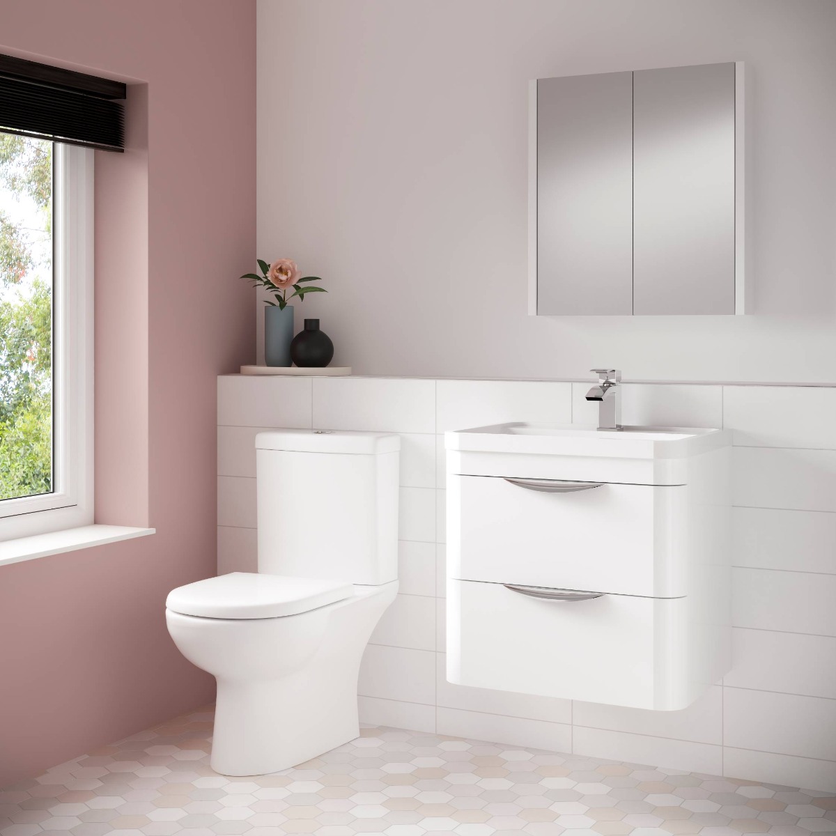 white furniture in pink bathroom